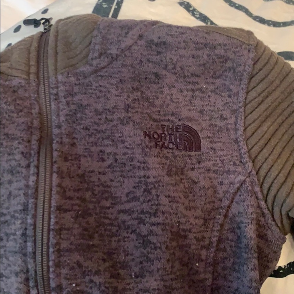 Green north face jacket